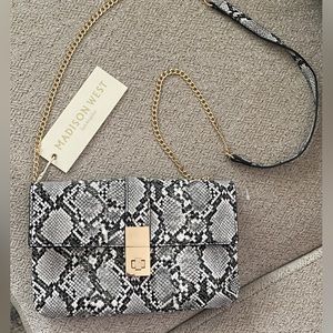 Beautiful snake skin purse or clutch. NWT